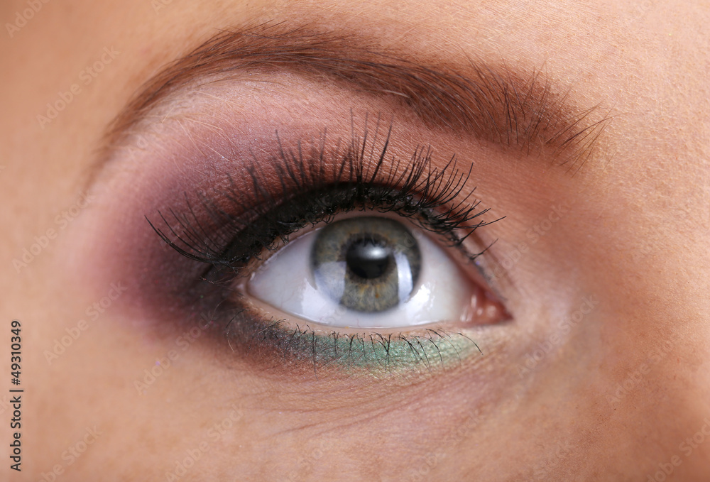 Beautiful female eye with bright make-up, close up Beautiful female eye with bright make-up, close up