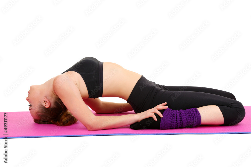 Young woman doing fitness exercises isolated on white Young woman doing fitness exercises isolated on white