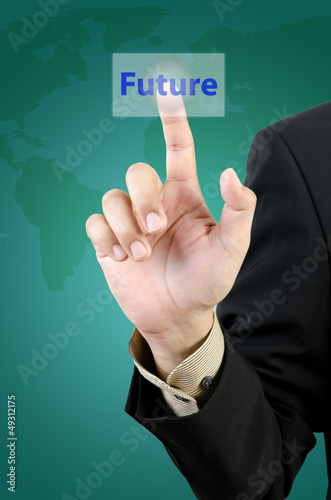 businessman hand touching future button