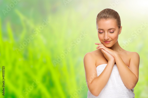 Young healthy girl on spring background