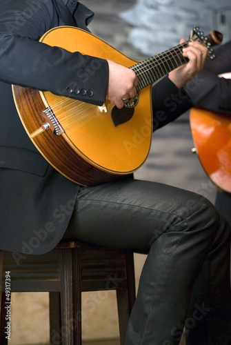 Close up of a traditional portuguese guitar photo
