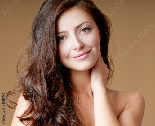 beautiful brunette with perfect hair photo