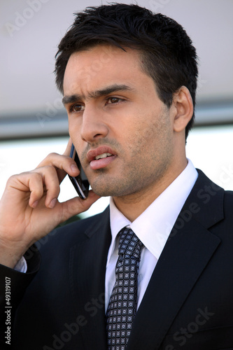 Businessman using a cellphone