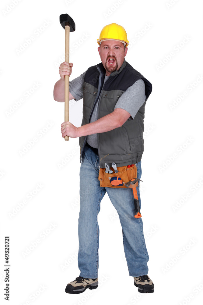 Angry construction worker with sledge-hammer Angry construction worker with sledge-hammer