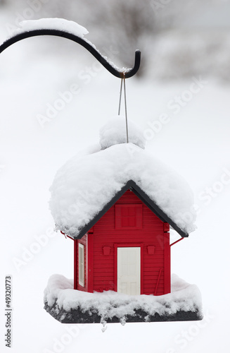 Snow Covered Red Bird House