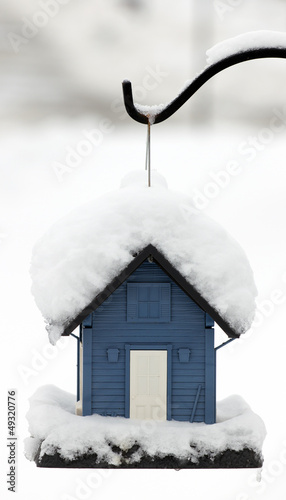 Hanging Blue Snow Covered Bird House