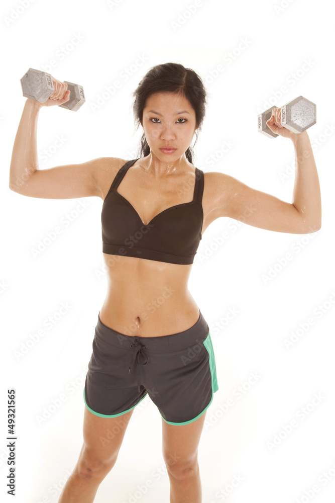Asian woman black top weight up look Asian woman black top weight up look