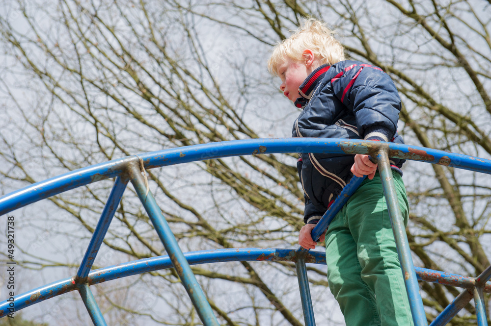 Child playing in playgarden Child playing in playgarden