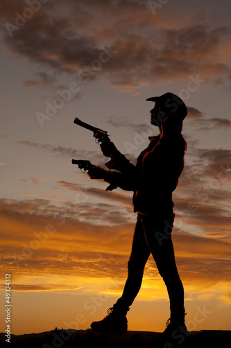 silhouette woman guns side point