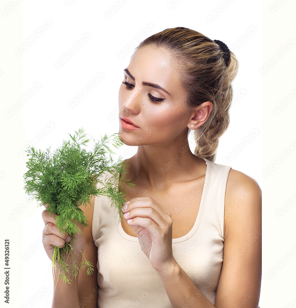 Close-up portrait of happy young woman with bundle herbs (dill) Close-up portrait of happy young woman with bundle herbs (dill)