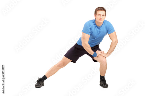 Full length portrait of a young maleathlete exercising