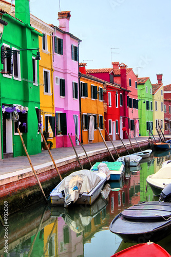 Obraz na plátně Colorful houses along a canal in Burano, near Venice, Italy