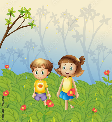 A girl and a boy in the garden