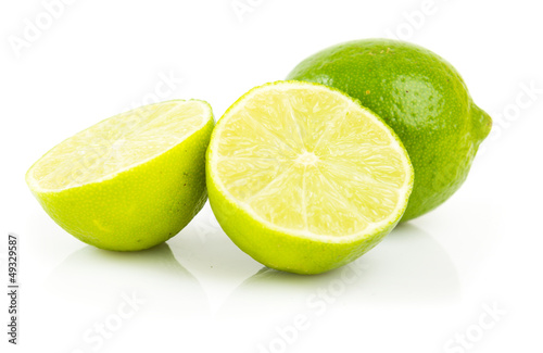 Fresh green limes. Isolated on white