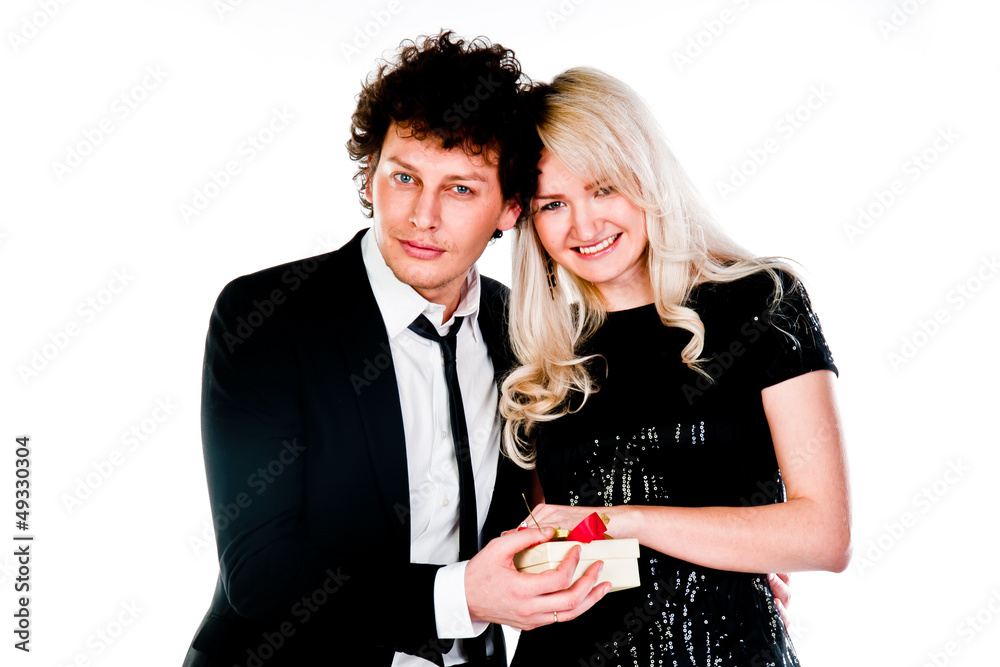 man gives a young and beautiful woman a gift man gives a young and beautiful woman a gift