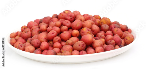 Small Red Potatoes on a bowl over white background
