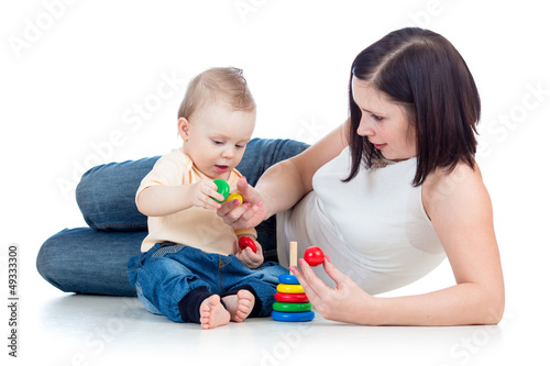 baby boy and mother playing...