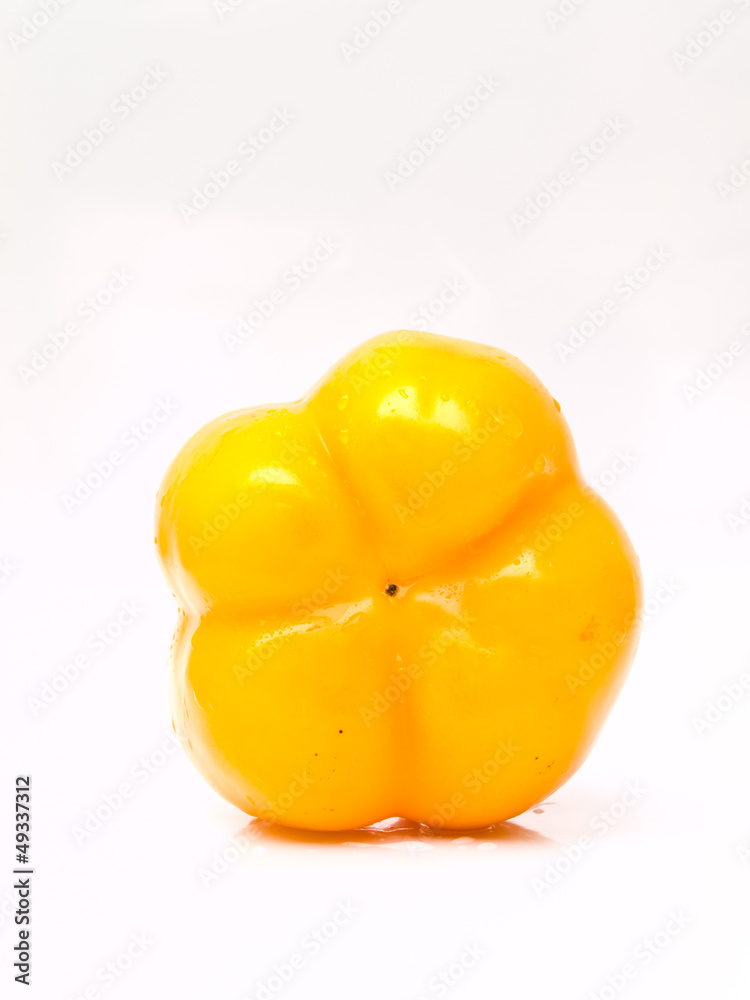 Fresh yellow bell pepper, Capsicum annuum, isolated on white bac Fresh yellow bell pepper, Capsicum annuum, isolated on white bac