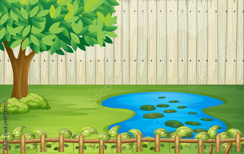 A tree, a pond and a beautiful landscape