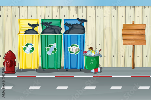 Dustbins, a fire hydrant and a notice board