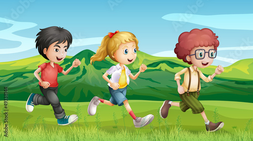 Kids running across the hills