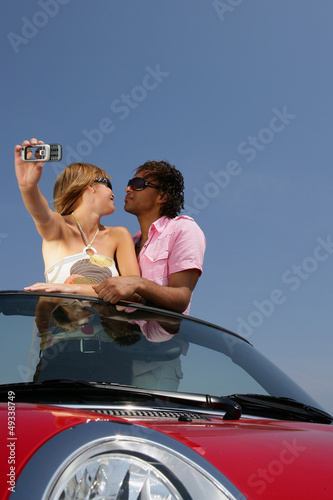 Couple taking their own photo © auremar