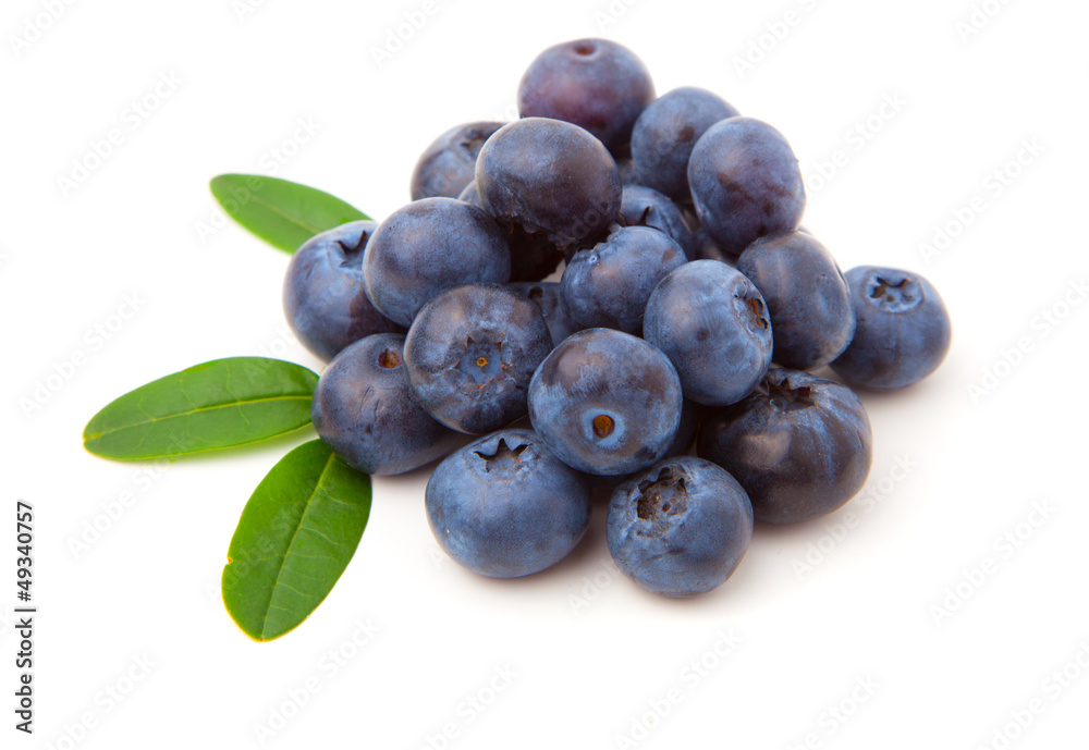 Blueberries with green leaves isolated on white background Blueberries with green leaves isolated on white background