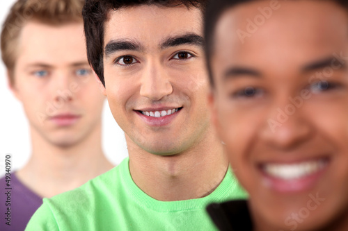 Fototapet Ethnically diverse group of young men