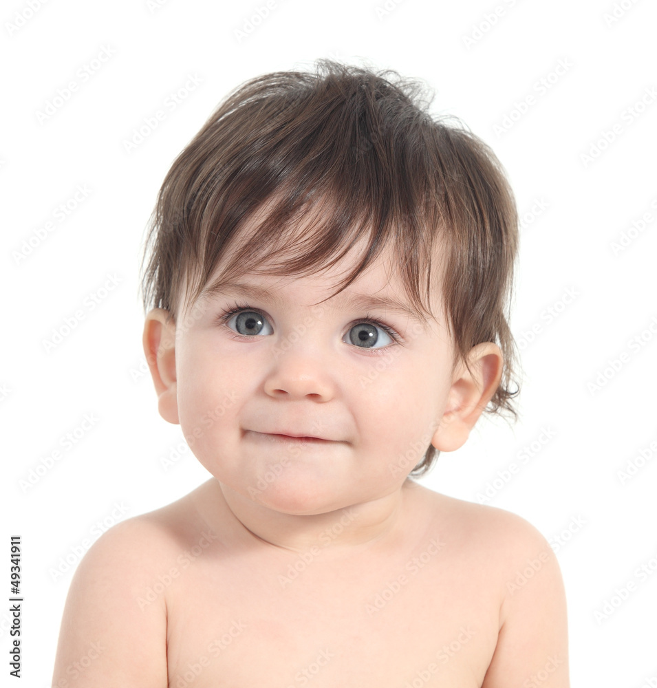 Baby smiling and watching attentive with a big grey eyes Baby smiling and watching attentive with a big grey eyes