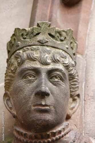 stone carved head statue of Queen Victoria with crown jewels