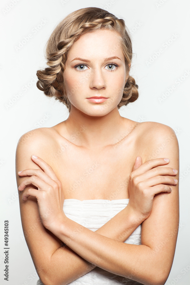 Portrait of young woman with braid hairdo Portrait of young woman with braid hairdo
