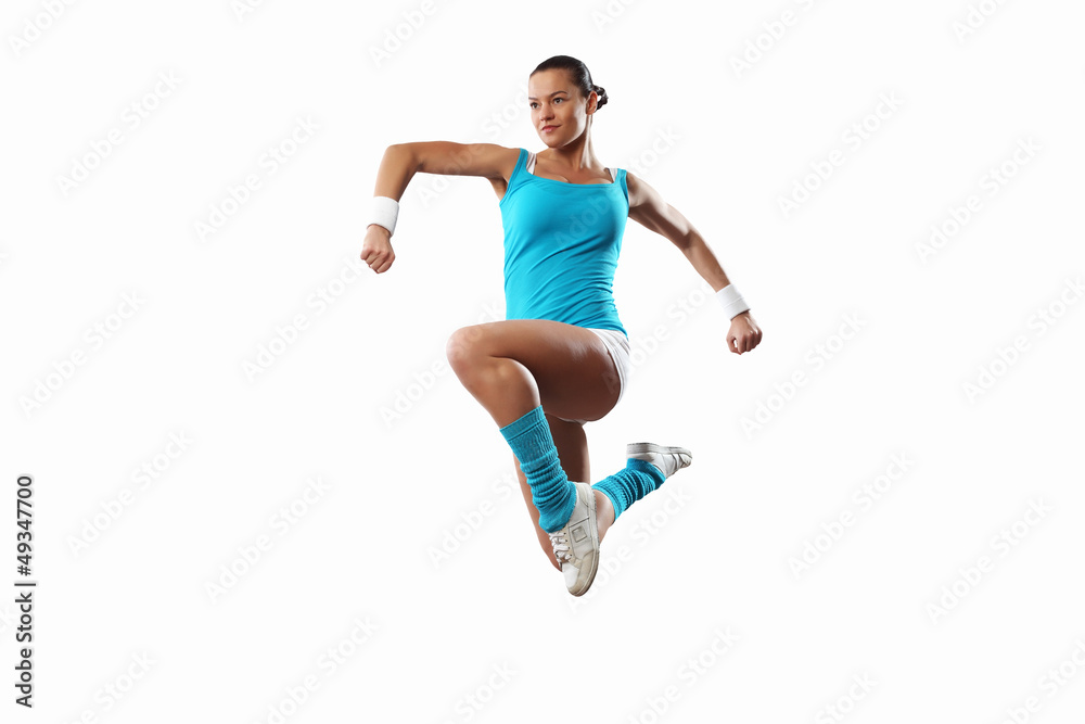 Fototapeta premium Image of sport woman jumping