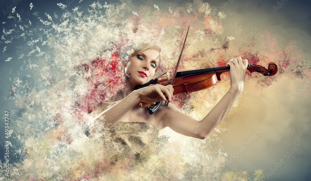 Gorgeous woman playing on violin