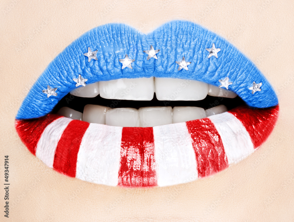 Fototapeta premium Beautiful female lips painted with American flag