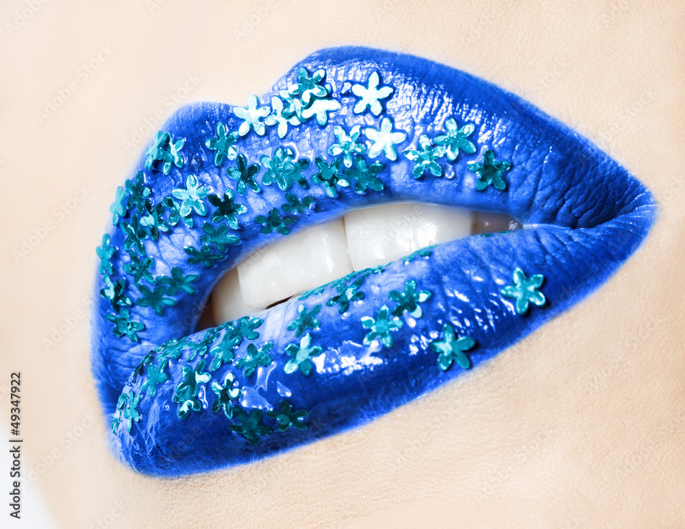 Naklejka premium Beautiful female lips blue with flowers
