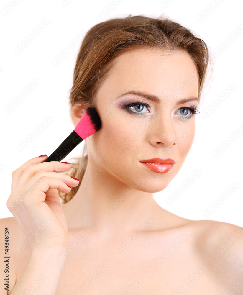 portrait of beautiful woman with make-up brush for powder,
