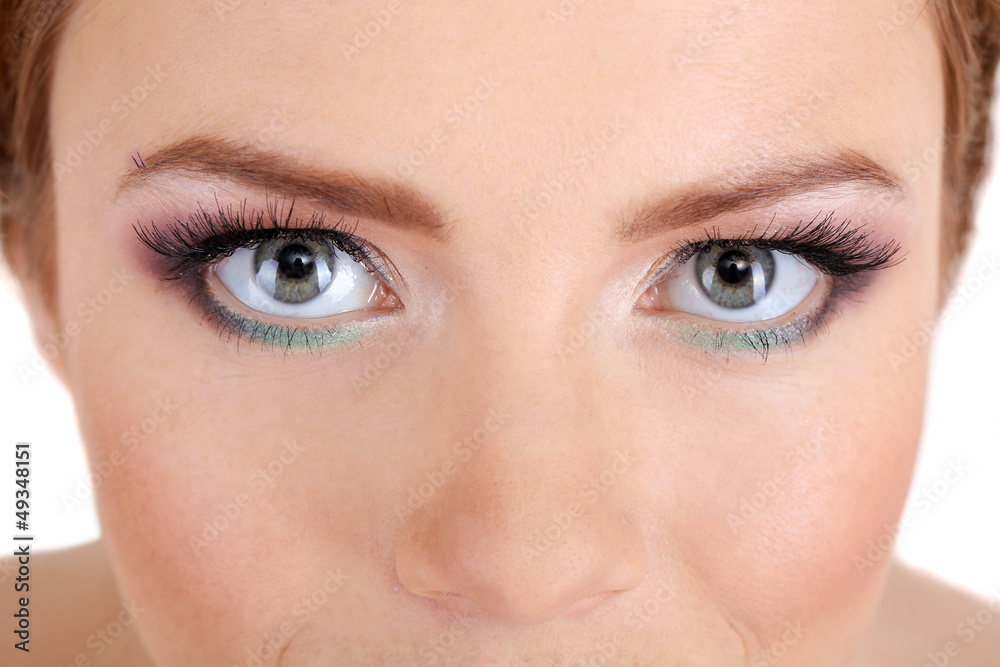 Naklejka premium Beautiful female eyes with bright make-up, close up