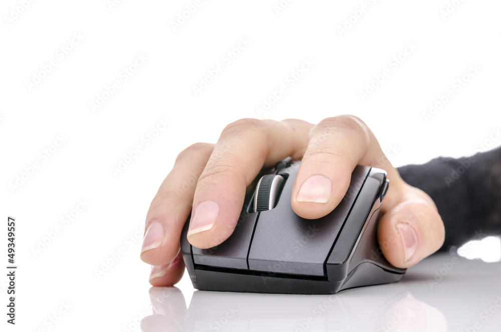 Female hand using a computer mouse Female hand using a computer mouse