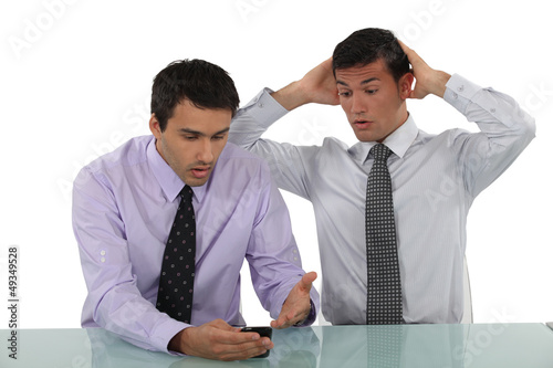 Two businessmen having an argument photo