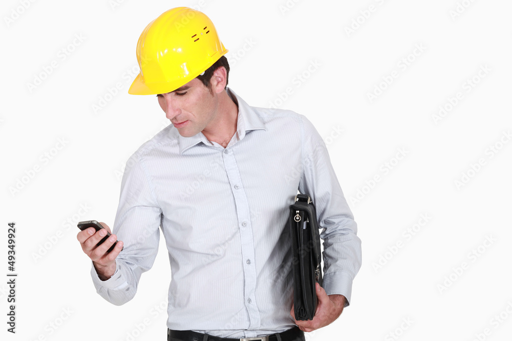 Architect with a briefcase and phone Architect with a briefcase and phone