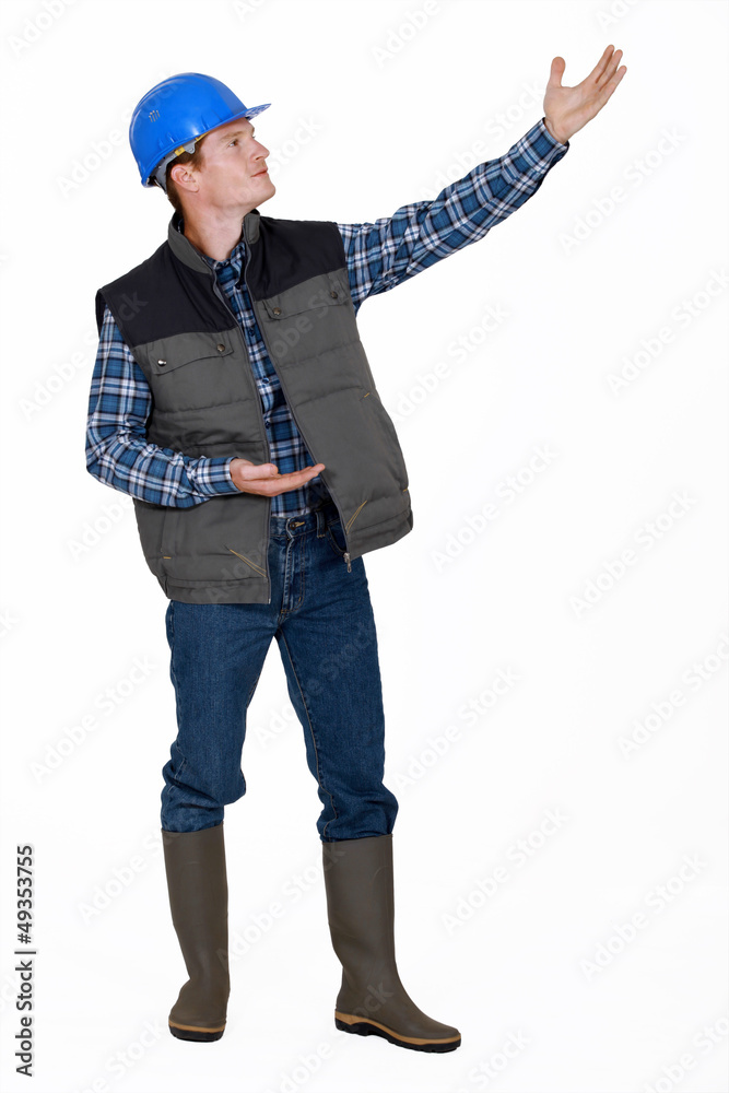 Tradesman presenting a new machine