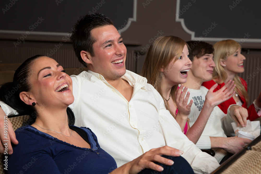 Laughing audience at the movies