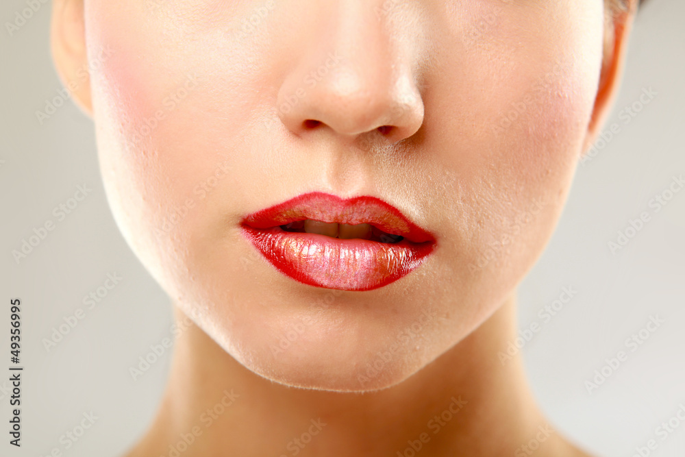 Obraz premium A half of face a beautiful woman isolated on white