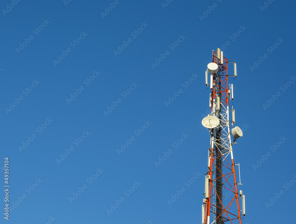 Communication tower on blue sky background Communication tower on blue sky background
