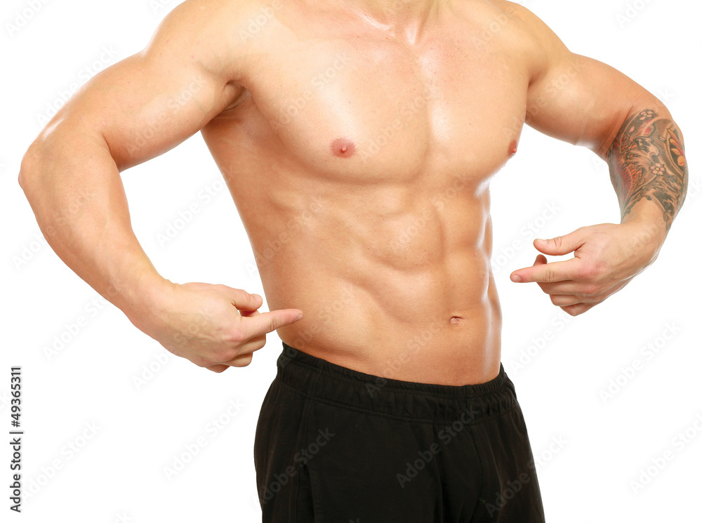 Muscular young man  showing abs, isolated o white background