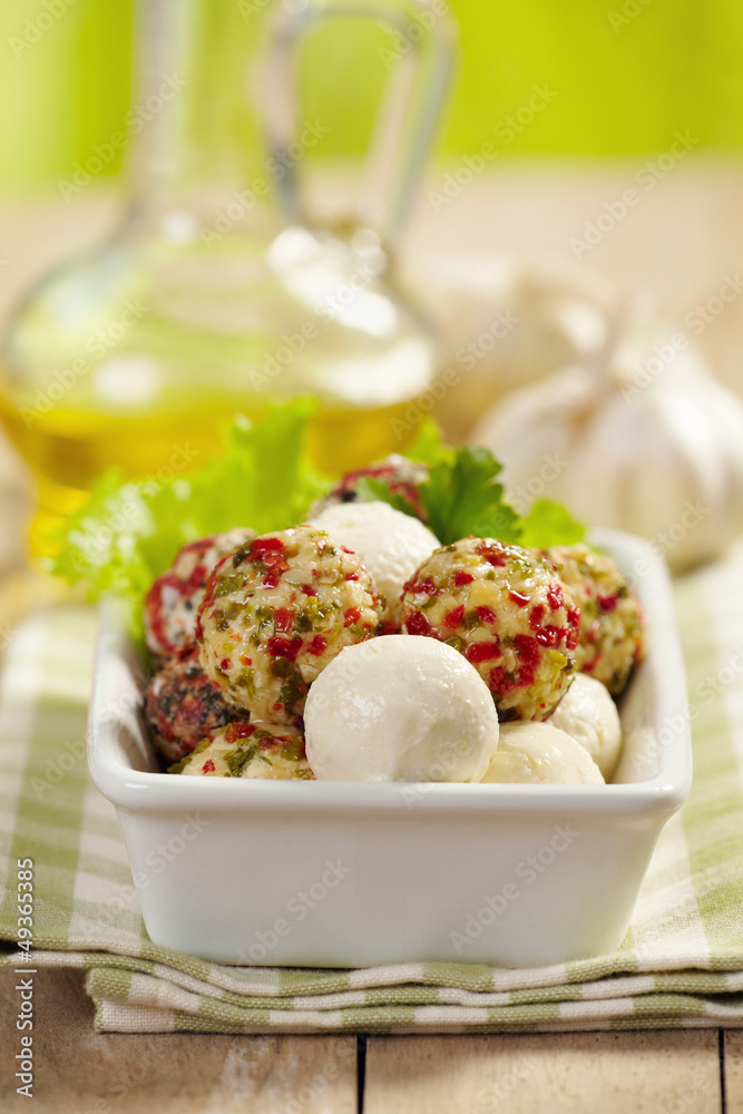 fresh cheese balls with oil and spices fresh cheese balls with oil and spices