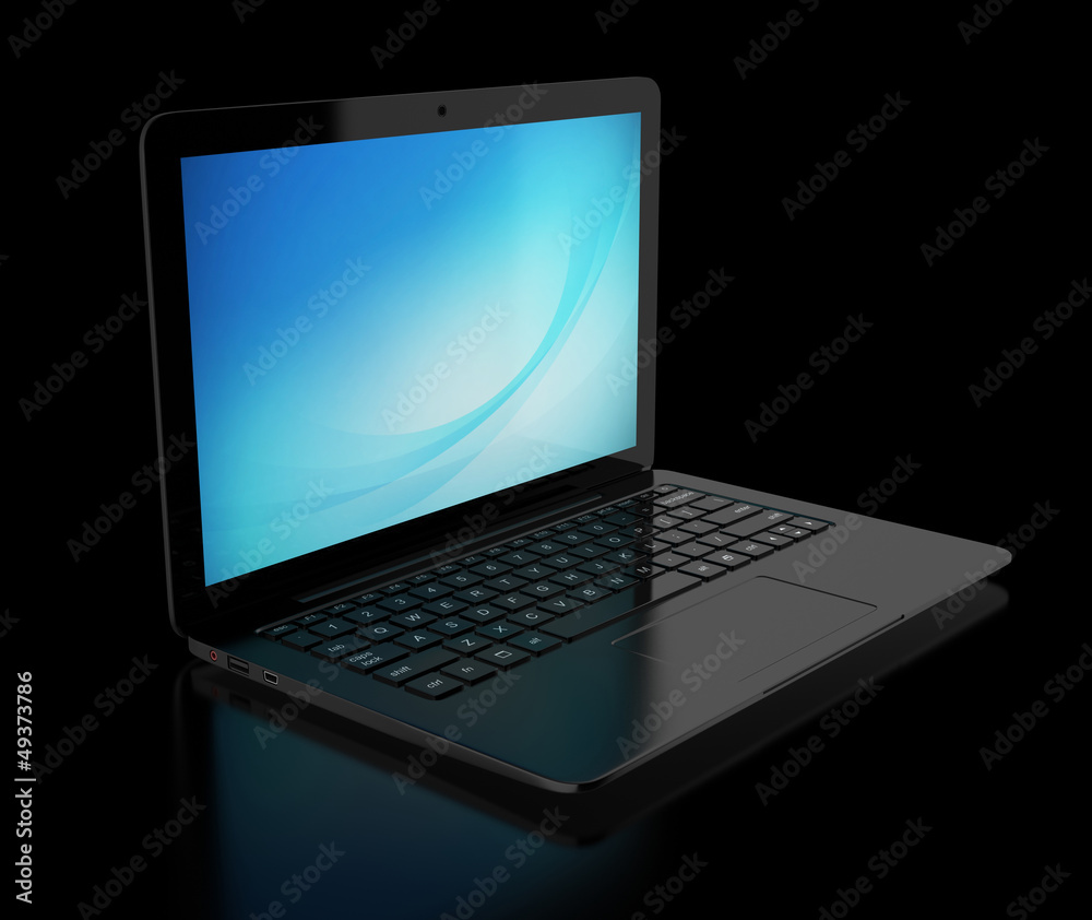 black laptop on the black background black laptop on the black background