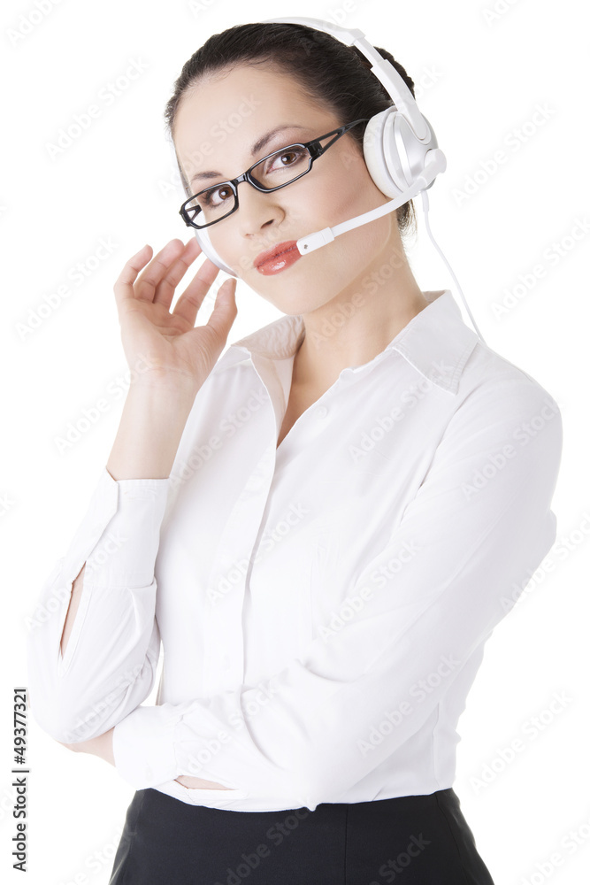 Beautiful young call-center assistant smiling Beautiful young call-center assistant smiling