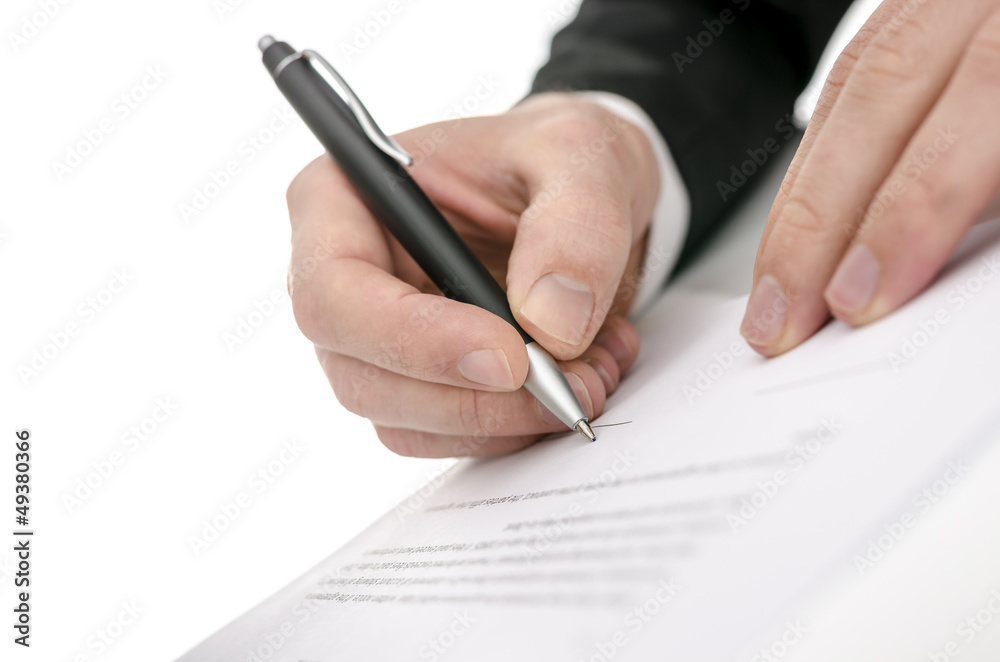 Business man signing a contract Business man signing a contract
