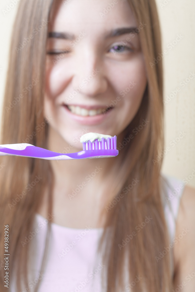 Portrait Of A Blond Woman Brushing Her Teeth Portrait Of A Blond Woman Brushing Her Teeth